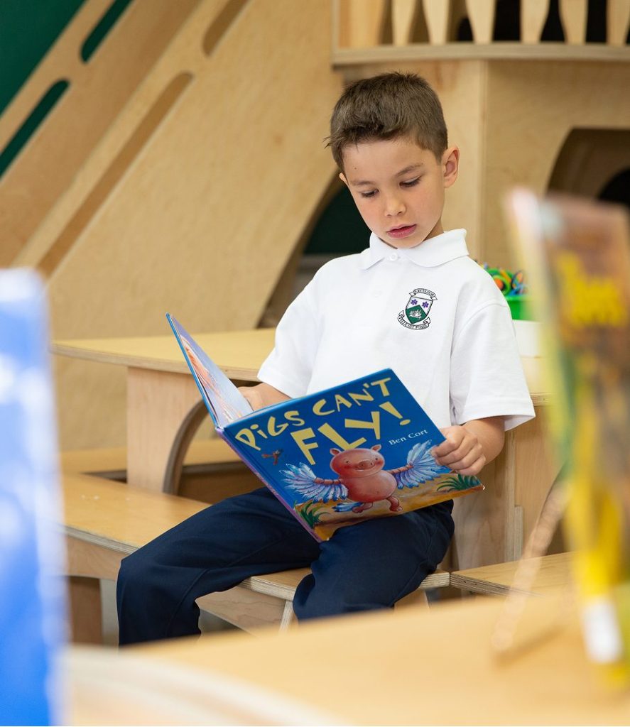 student reading book