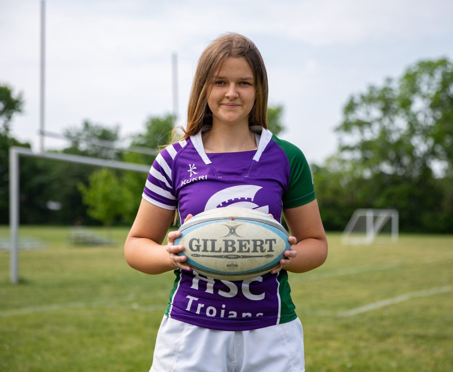 athletic girl with football