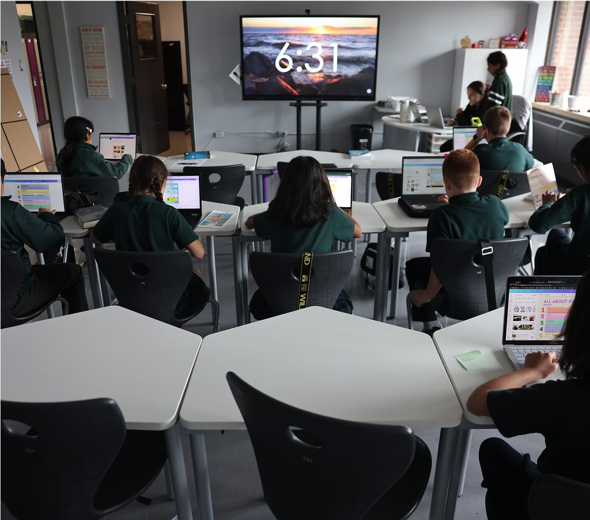 hsc students in classroom with laptops