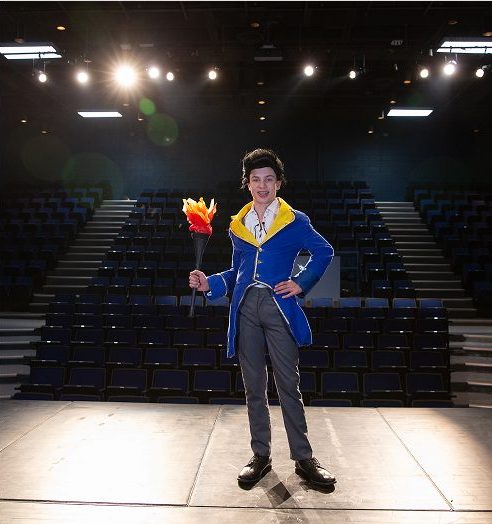 hsc student on stage in costume