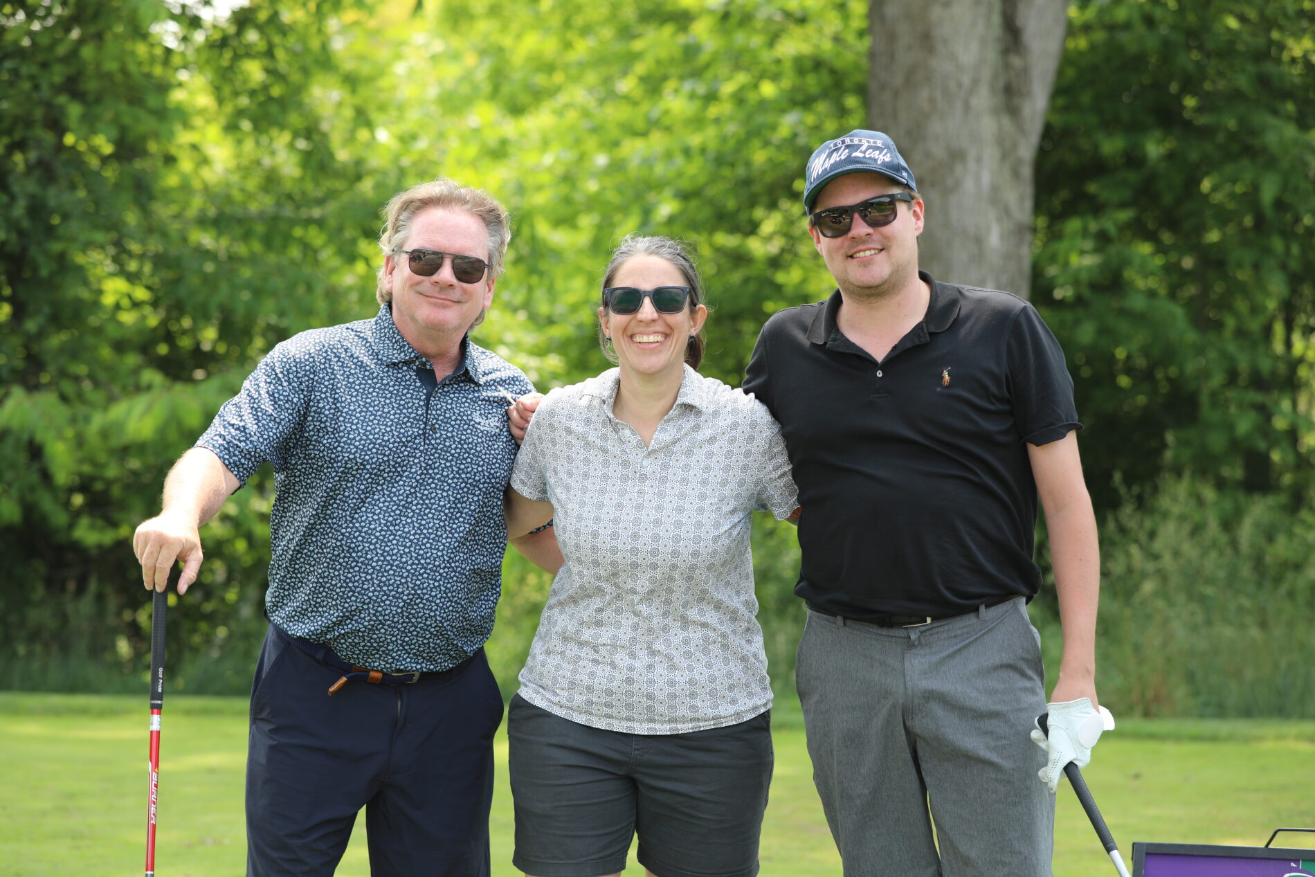 HSC community members get ready to golf