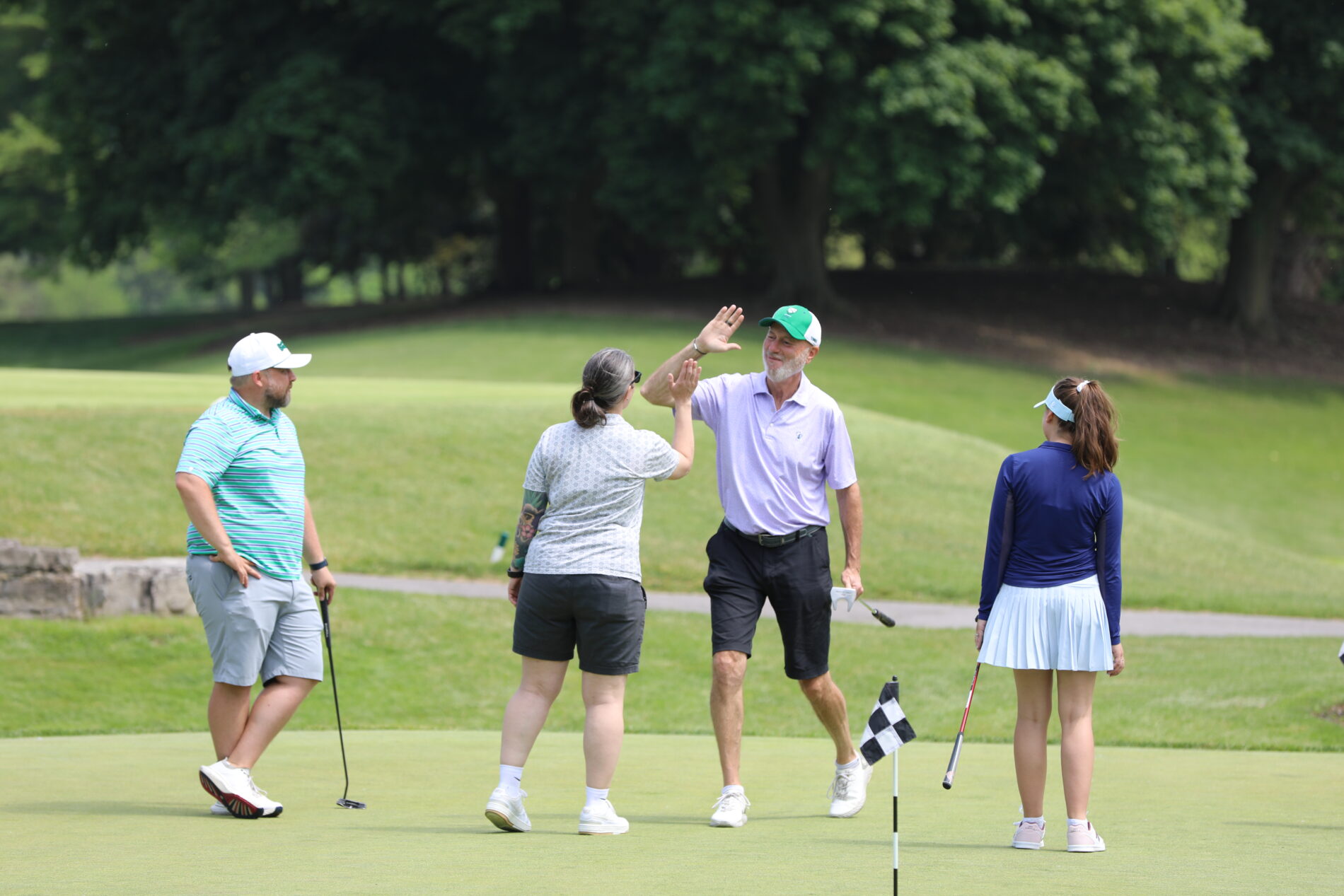 celebrating wins during the HSC golf classic