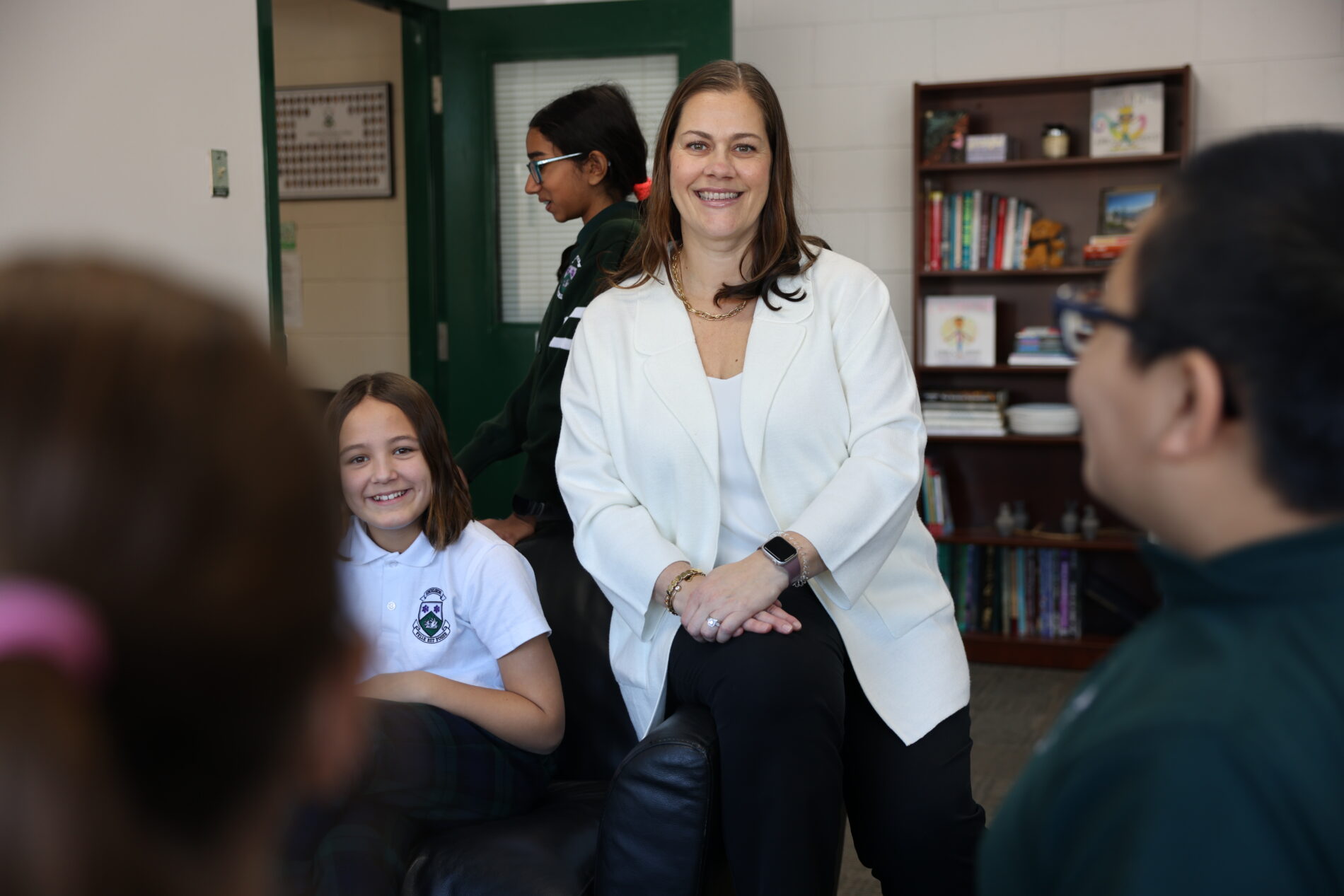 Middle School principal with students