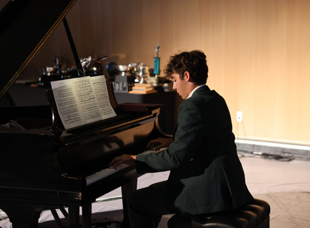 student playing piano